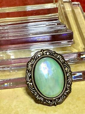 Vintage Jeri-Lou Scarf Clip Oval Iridescent Cabochon Gold Tone Filigree Frame